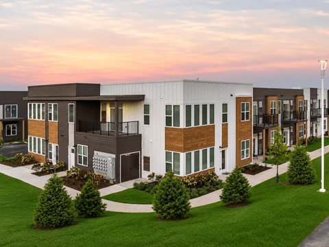 Modern townhome style apartment buildings at sunset at The Daniels 1 and 2 Apartments, Wisconsin, 53080