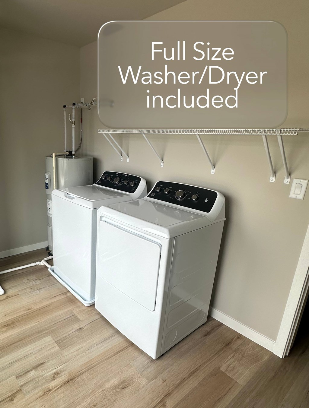 A white washer and dryer are included in the sale.