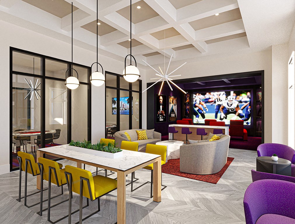 a rendering of a clubhouse with a large tv in the background and a table with yellow chairs at Altis Grand Lake Willis, Orlando Florida