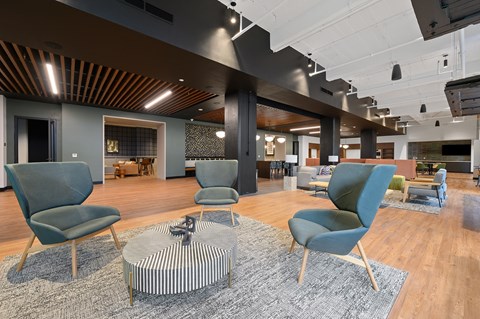 a large open space with chairs and couches