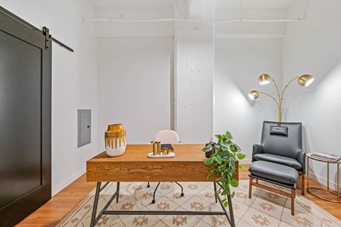 a room with a desk and chair