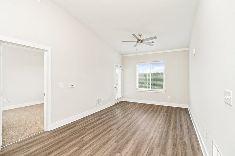 a picture of a room with alternating alternating walls and ceilings and a ceiling fan