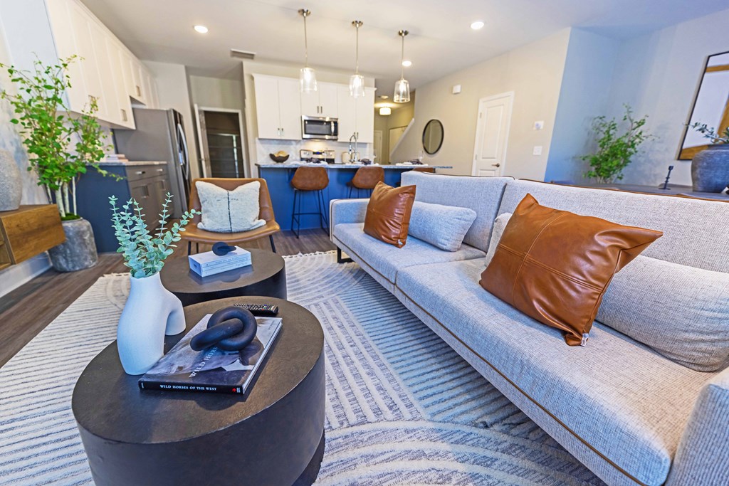 a living room with a couch and coffee table