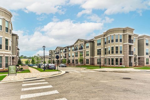 an empty street with a building on the side of it