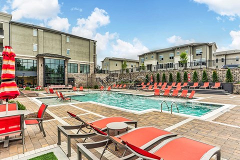 our apartments have a large pool and lounge chairs