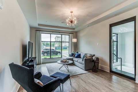 a living room with a couch and a tv