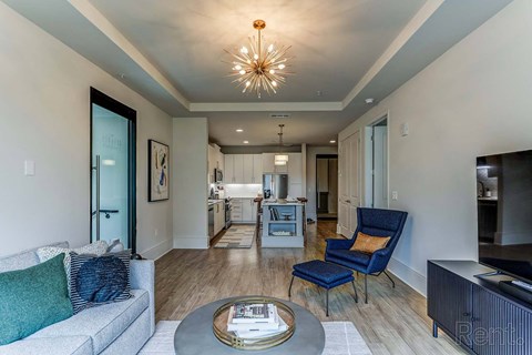 a living room with a couch and a table