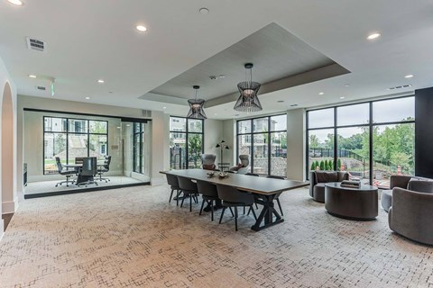 a large conference room with a large table and chairs