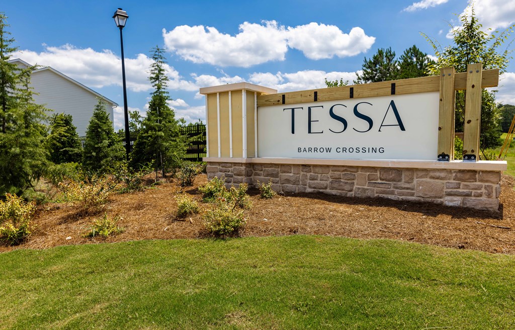 a sign for tesla battery crossing