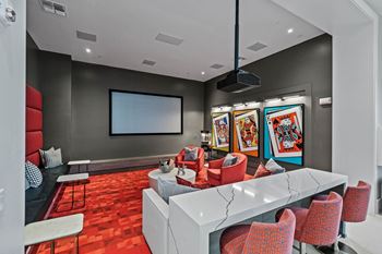 a conference room with a white table and chairs at Altis Twin Lakes Apartments, Florida