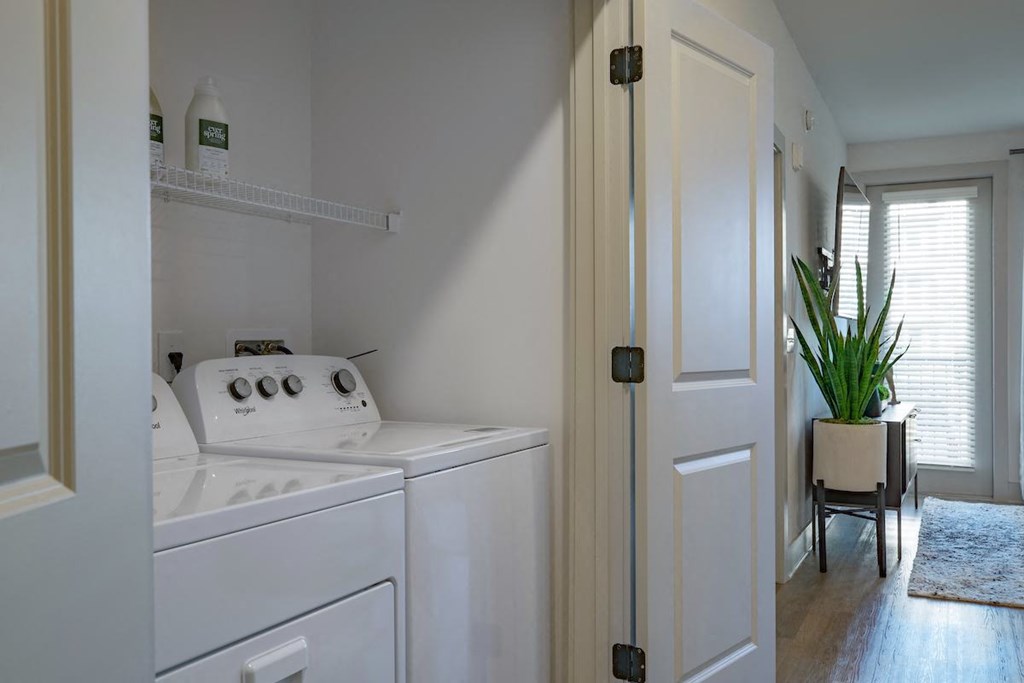 a view of the inside of a church with white doors