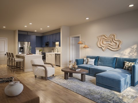 A modern living room with a blue couch and a wooden coffee table.