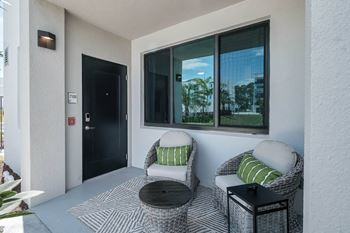 A black door with a glass window above it at Altis Santa Barbara, Florida