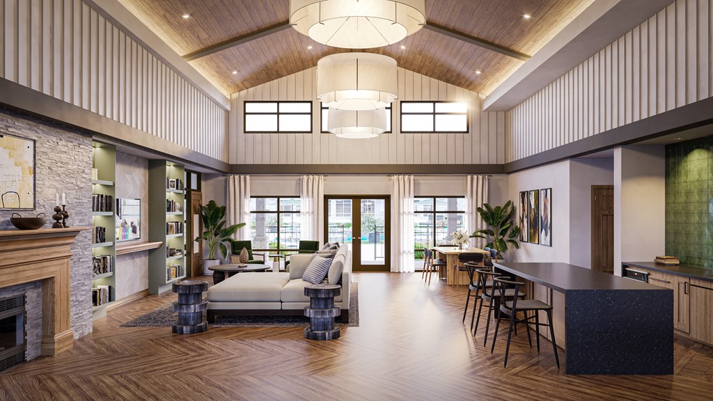 3 BR Apartments in Huntsville, AL - Paxton Place - Clubroom With Couch, Bookshelves, and Bar Seating