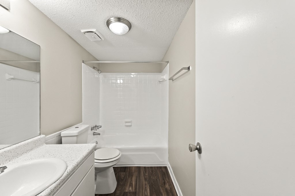 the preserve at ballantyne commons apartment bathroom with toilet sink and tub