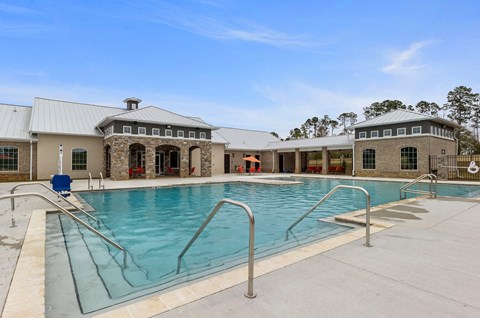 the preserve at ballantyne commons pool and building with swimming pool