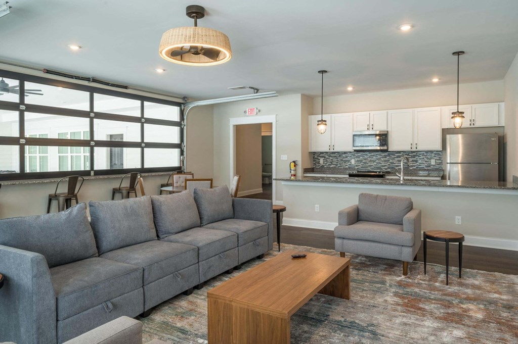 a living room with a couch and a table