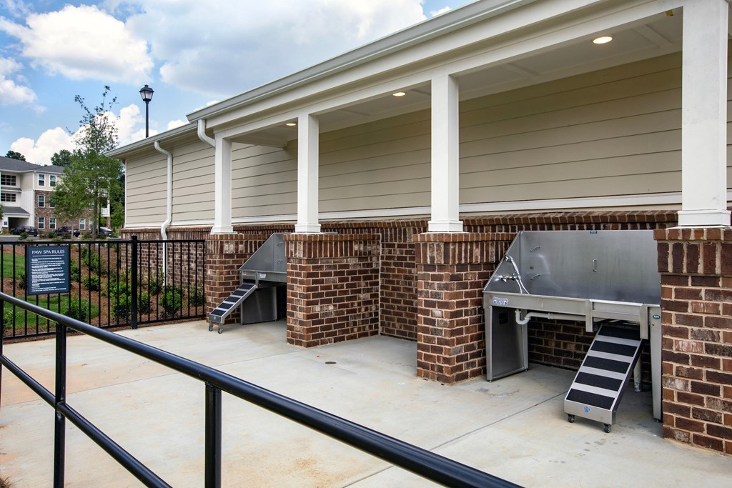 a bbq grill is available at the enclave at woodbridge apartments in sugar land,