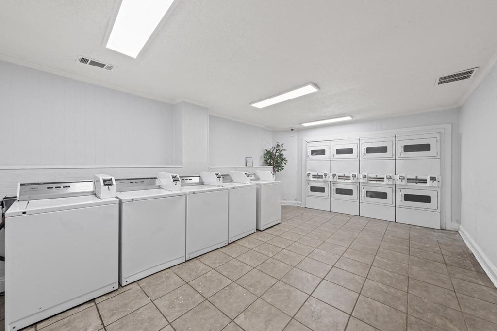 the laundry room is equipped with washes and dryers