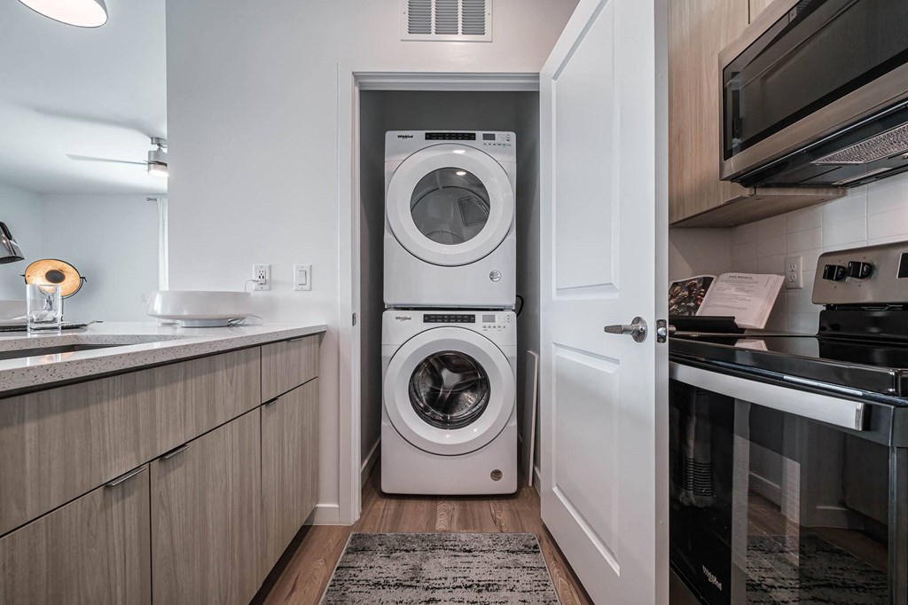 a small laundry room with a washing machine in it
