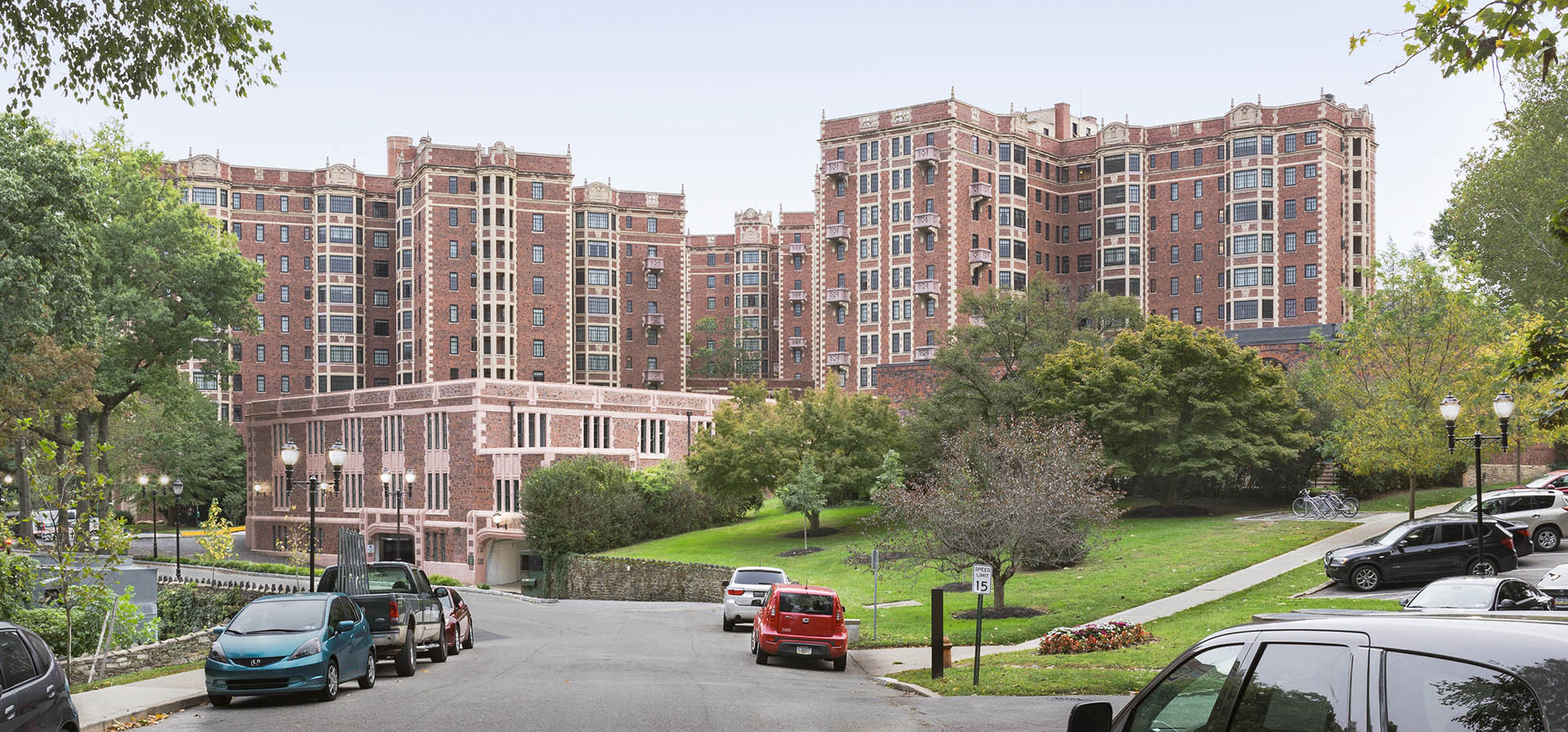 a view of the apartments from the street