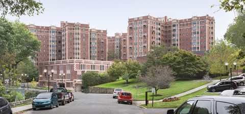 a view of the apartments from the street