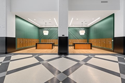 a view of a large room with lockers and a checkered floor