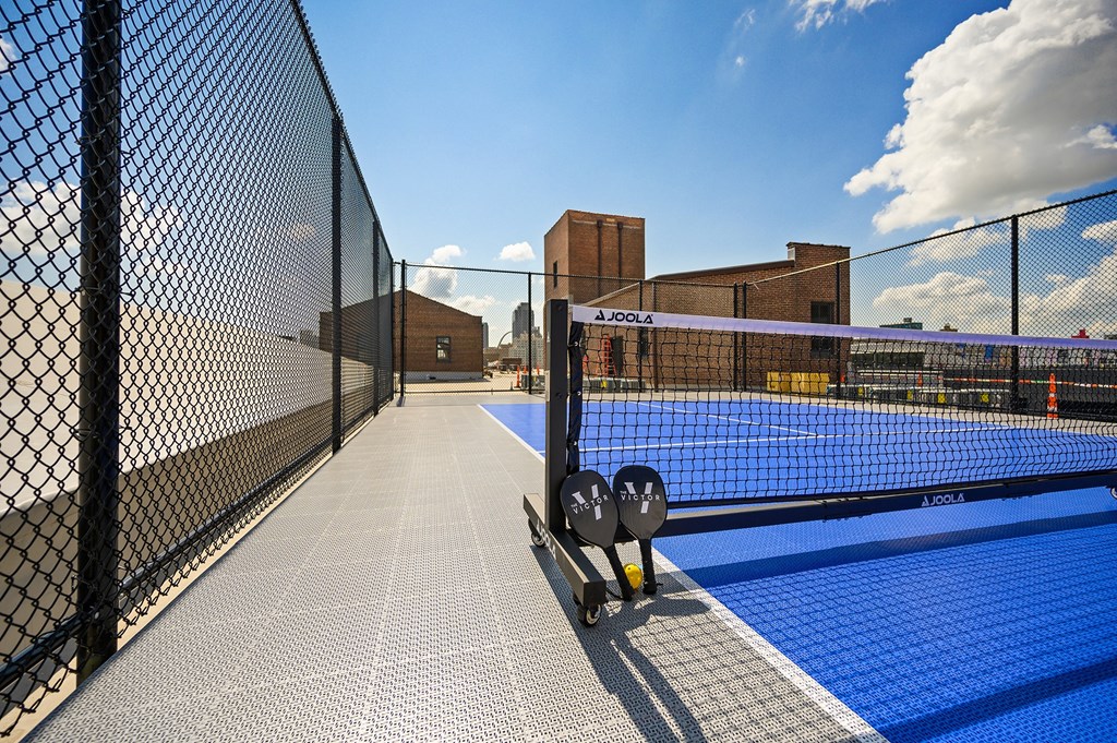 a tennis court on top of a building