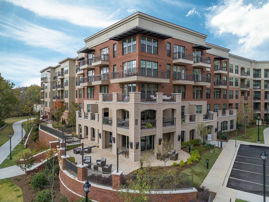 an exterior view of a large building with a courtyard