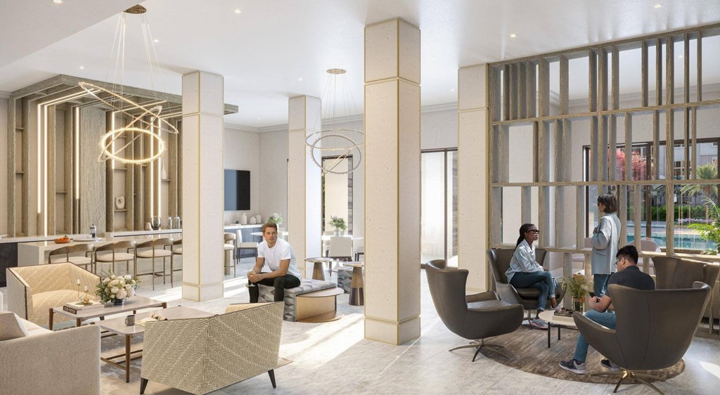 A modern living room with people sitting and chatting.