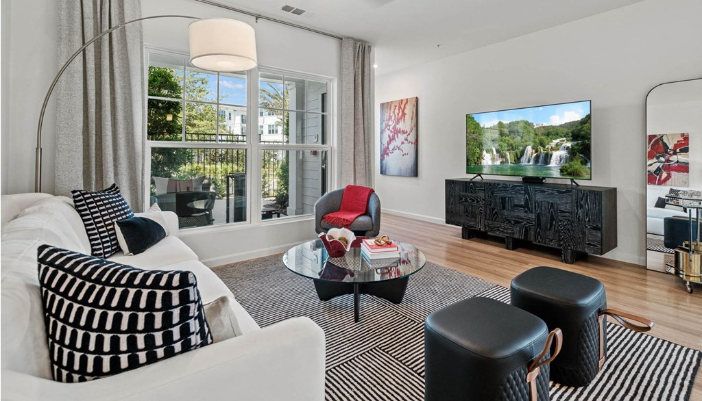 a living room with a couch and a tv