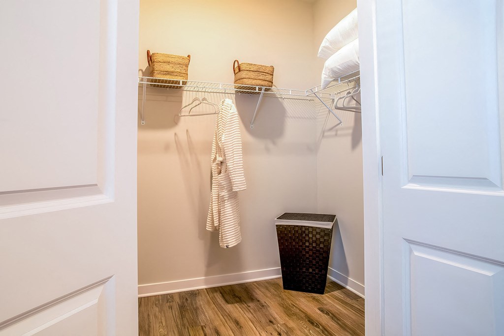 the preserve at ballantyne commons apartment closet with white walls and towels