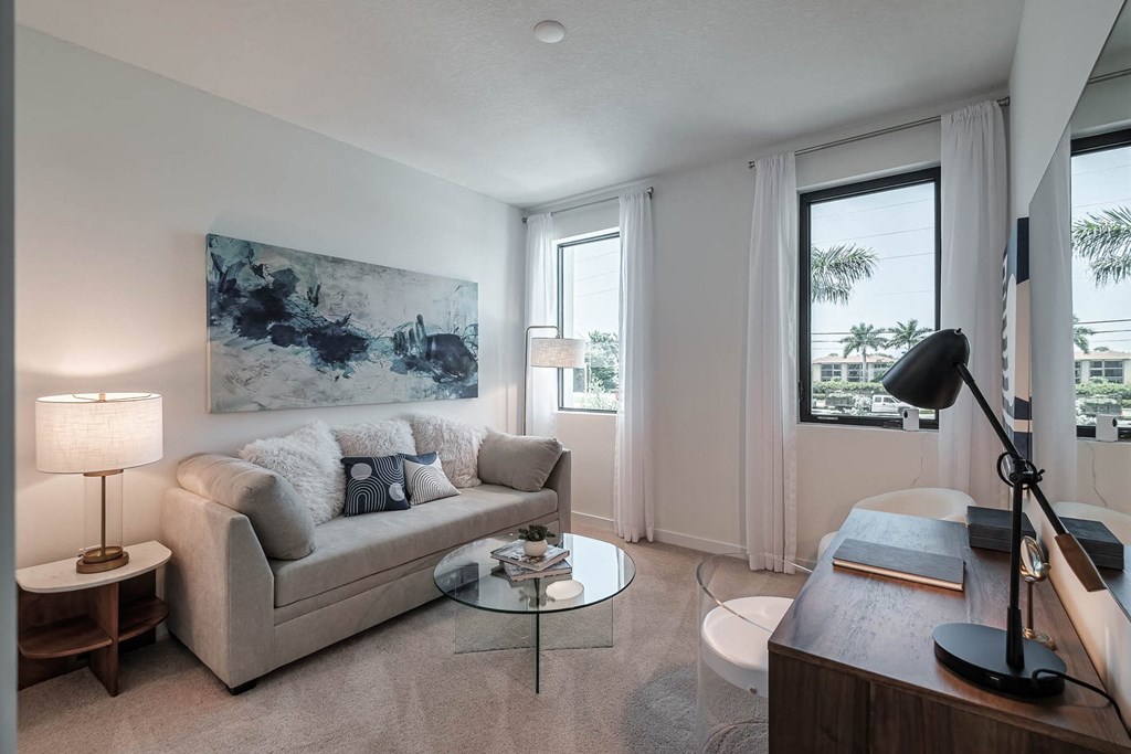 a living room with a couch and a table