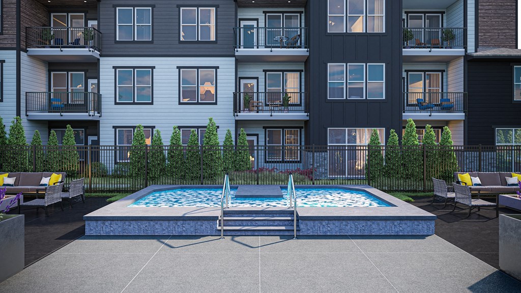 an outdoor pool with an apartment building in the background