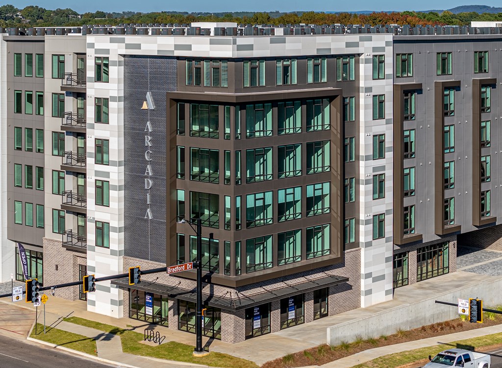 A modern building with the word "ARCADIA" on the front.