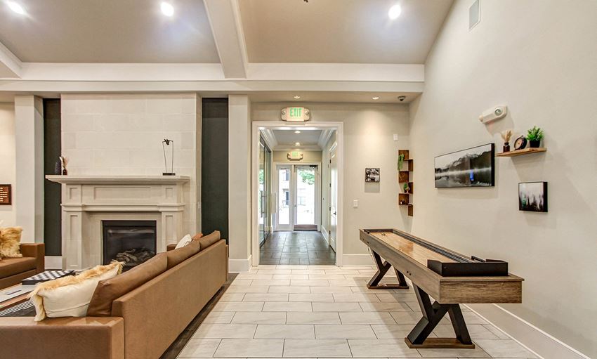 the reserve at bucklin hill clubhouse with shuffleboard table