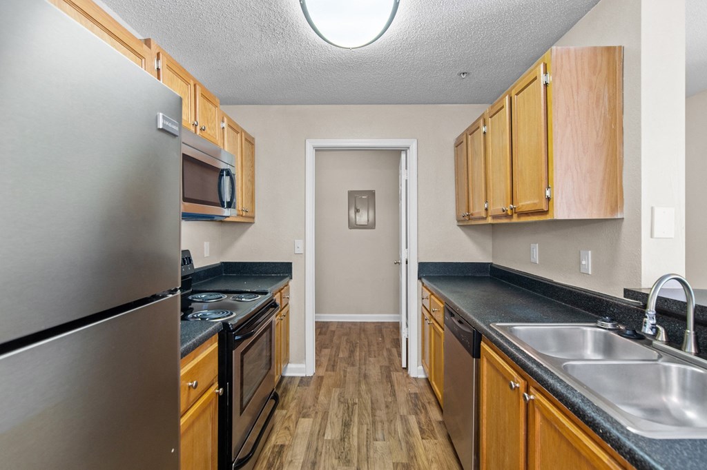 the preserve at ballantyne commons apartment kitchen with stainless steel appliances