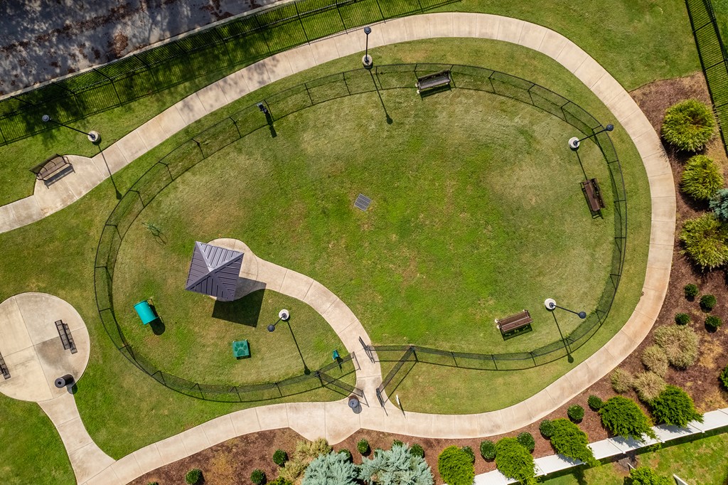 a birds eye view of a park with a dog park