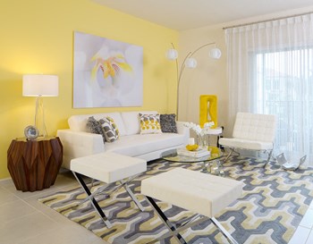 a living room with yellow walls and white furniture - Photo Gallery 24