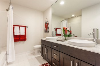 a bathroom with a sink and a toilet - Photo Gallery 19