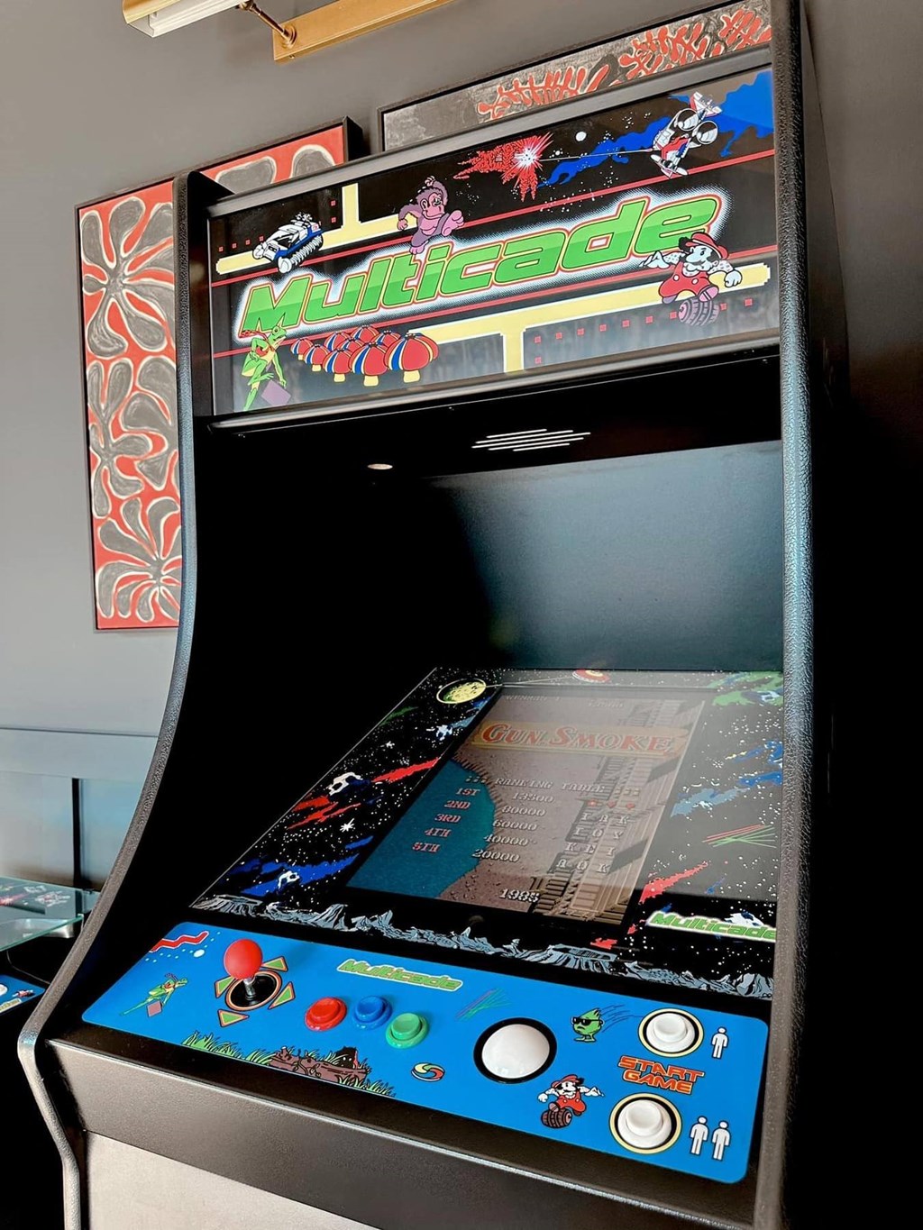 a video game on a stand in a room