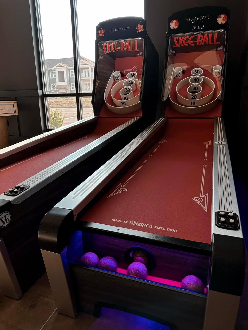 a game of skee ball at a bowling establishment