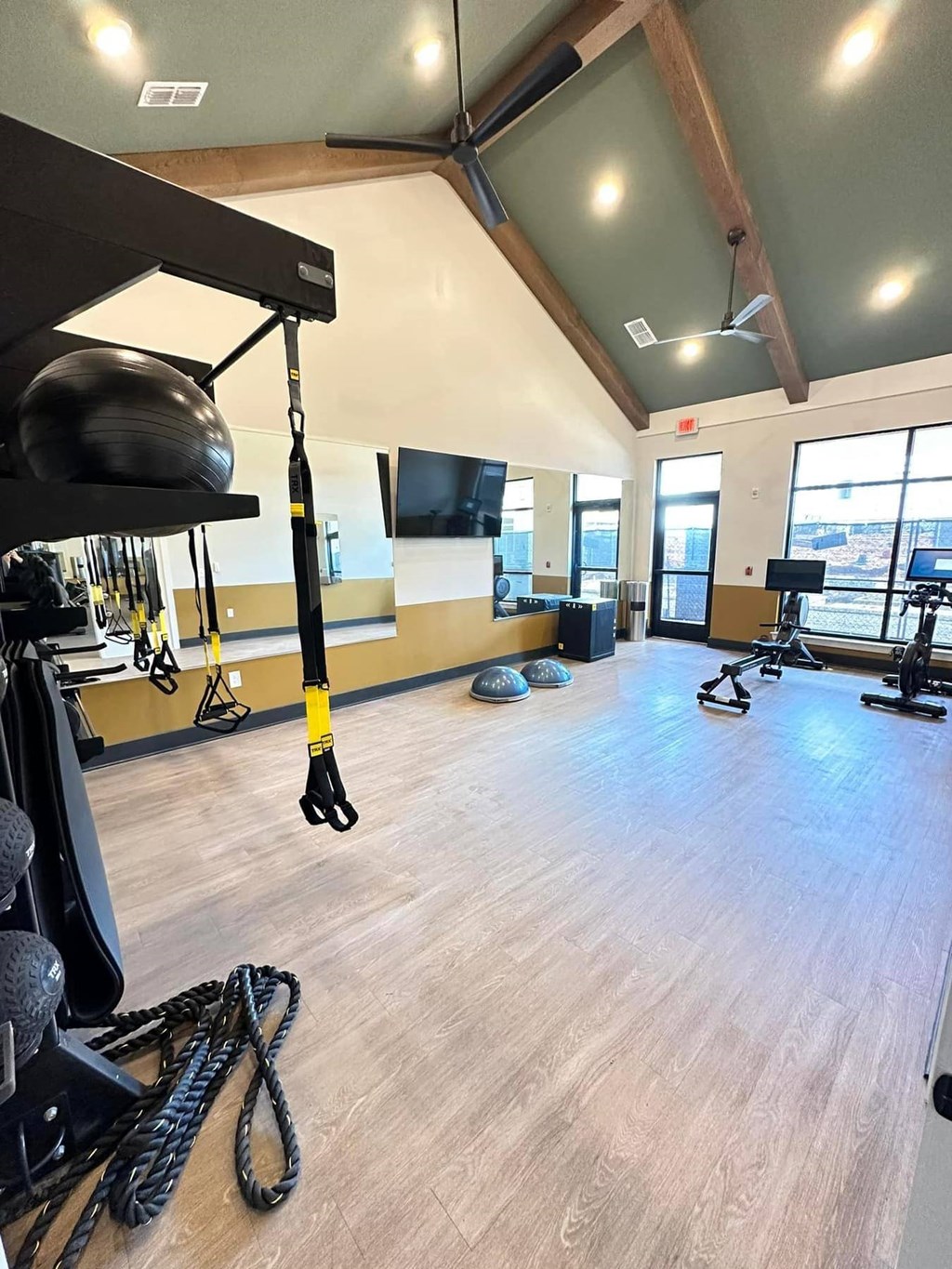 the gym in our new building is spacious and has a lot of equipment