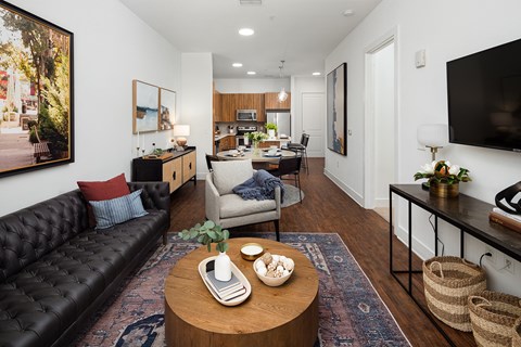 a living room with a couch and a table