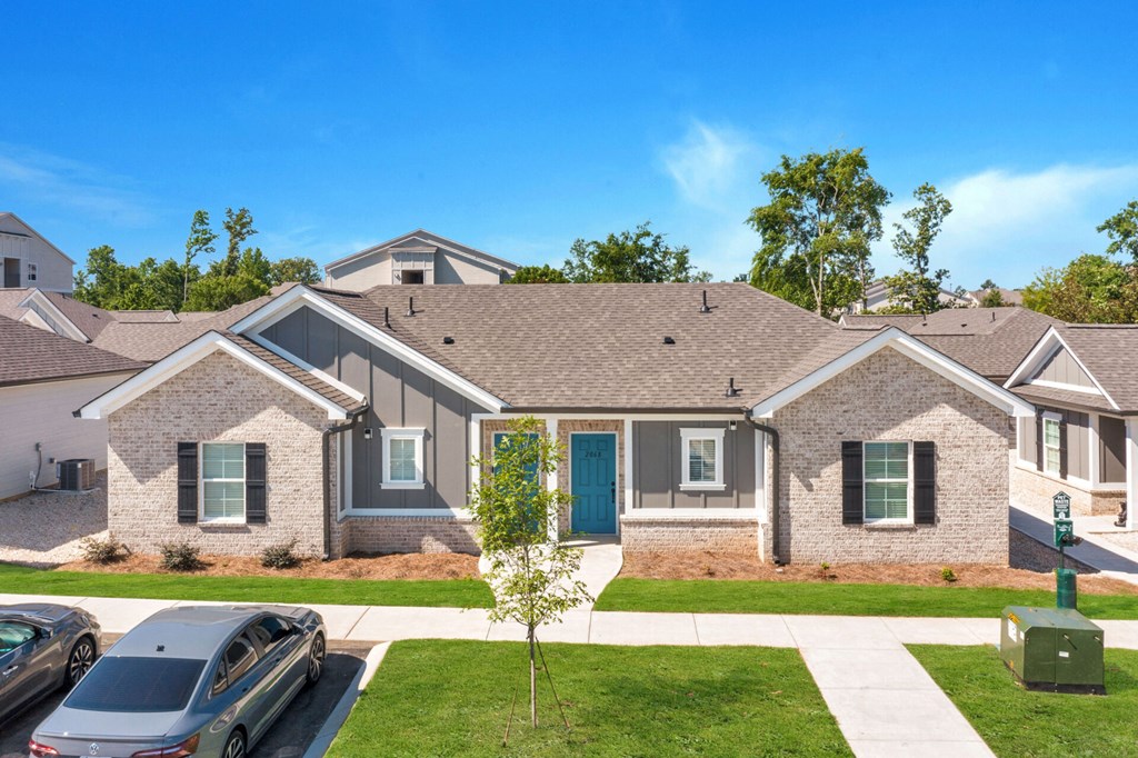 a house with cars parked in front of it