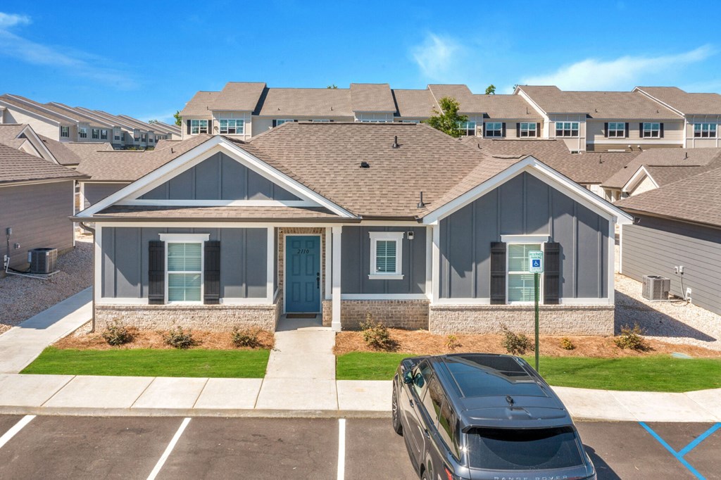 a house with a car parked in front of it