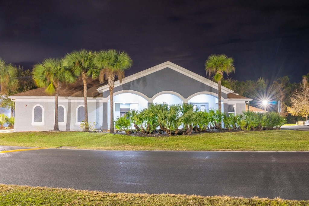 A building with a dark sky in the background.