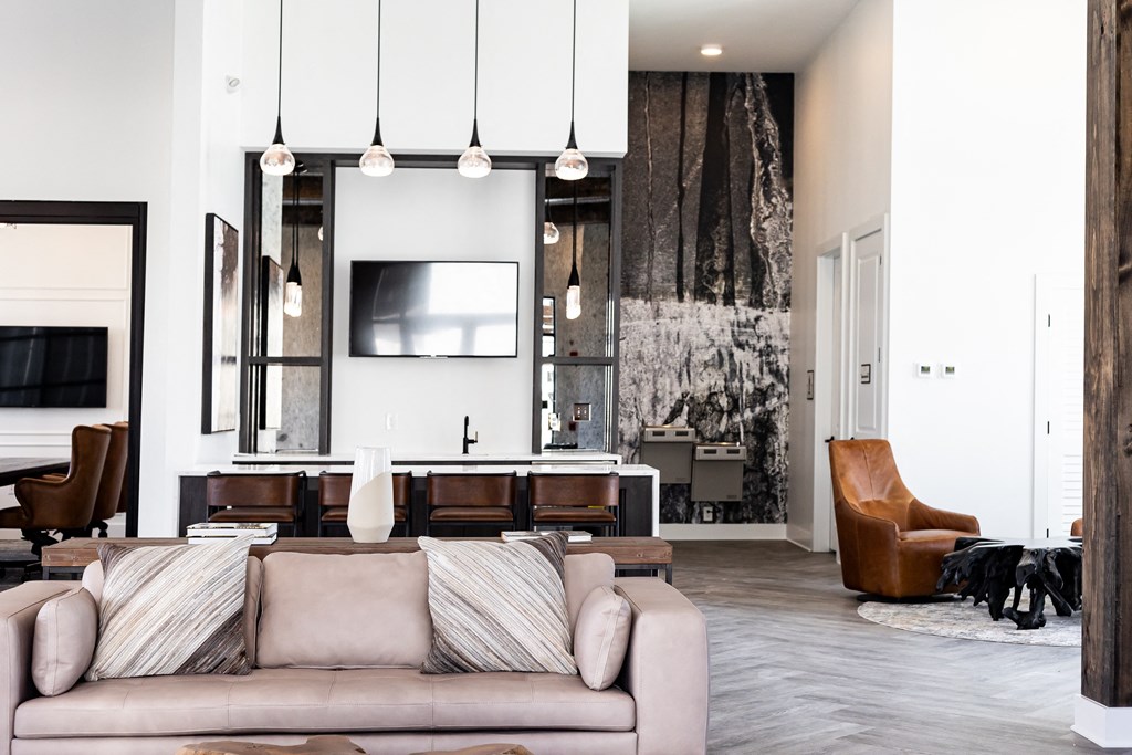 a living room with a couch and a tv