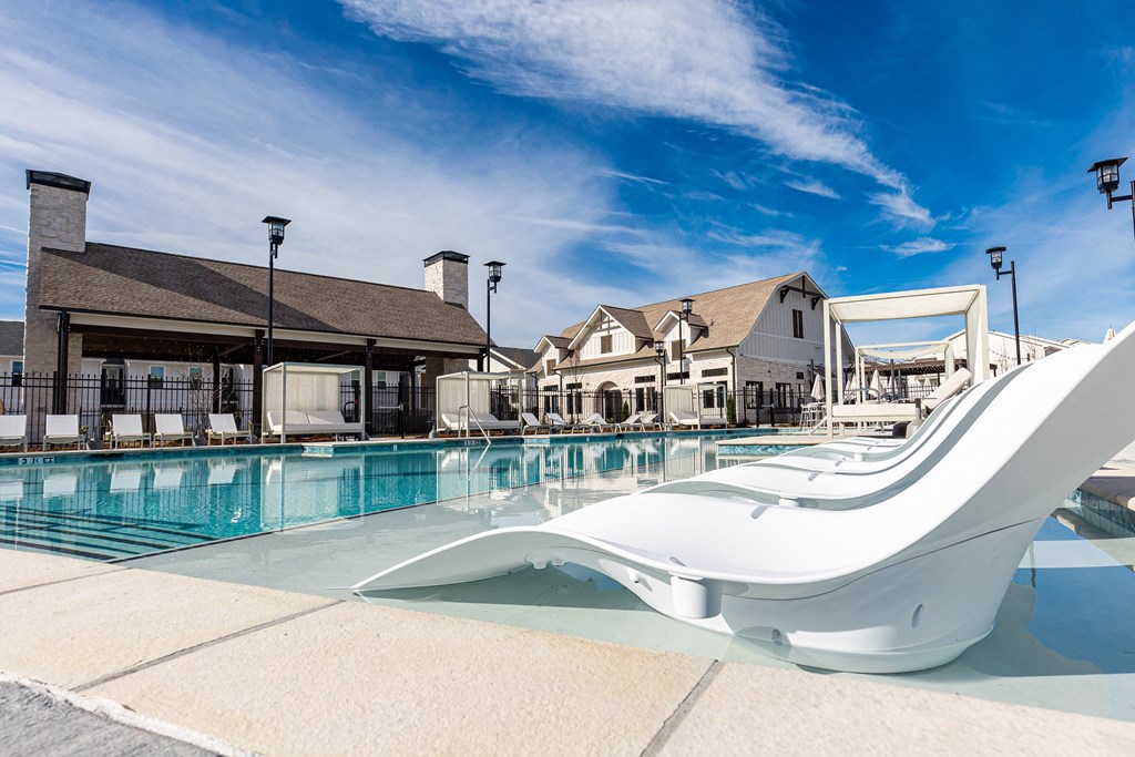 the pool at the villas at grande chapel apartments in grand