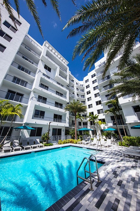 a large swimming pool in front of an apartment building at Saba Pompano Beach, Pompano Beach, 33062